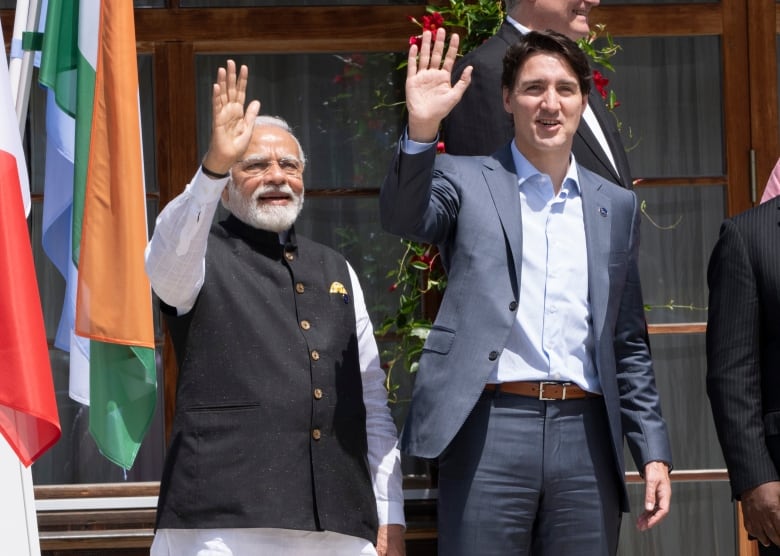 Prime Minister Justin Trudeau and Indian Prime Minister Narendra Modi wave during a family photo with Partner Countries and International Organizations at the G7 Summit in Schloss Elmau on Monday, June 27, 2022. 