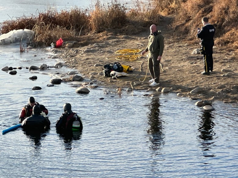 Search divers in a lake