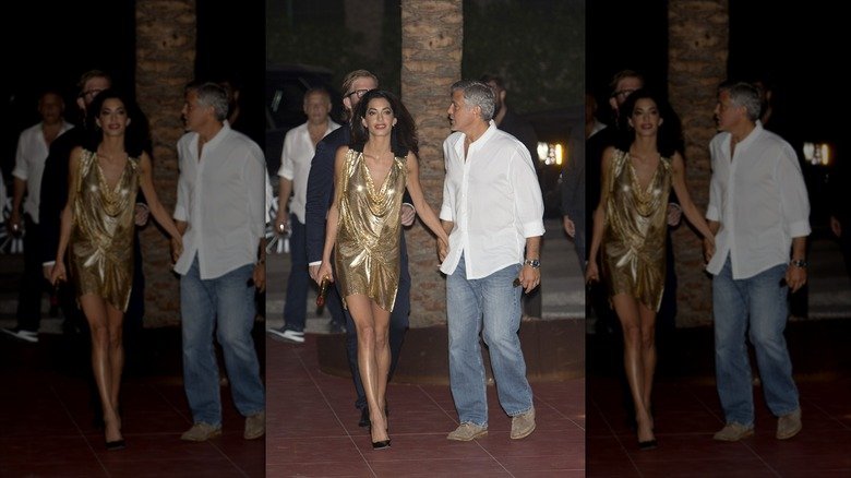 Amal Clooney's Outrageously Expensive Outfits 129 Amal Clooney in a gold dress; George Clooney in polo and jeans