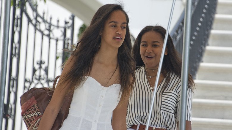 Malia and Sasha Obama leave the White House