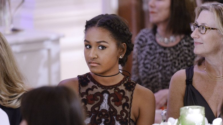 Sasha Obama attends a state dinner in the White House