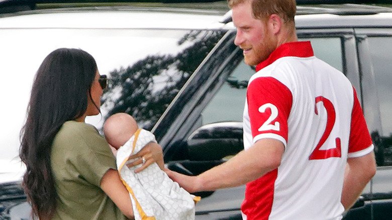 All The Rare Times We've Seen Prince Archie And Princess Lilibet 3 Meghan Markle and Prince Harry outside with Prince Archie