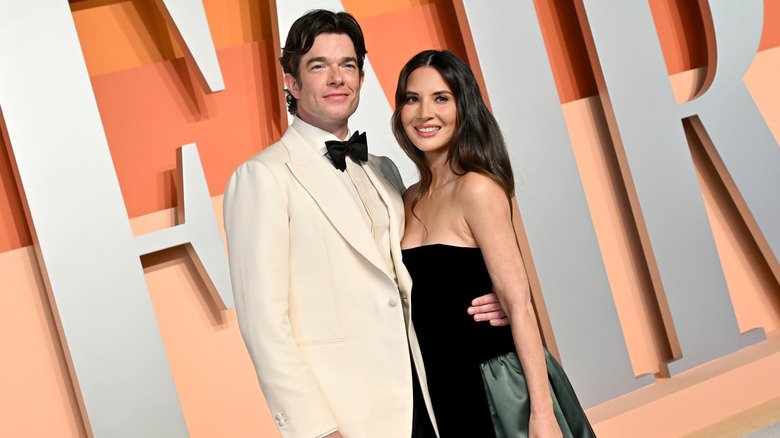 John Mulaney and Olivia Munn attending the 2025 Vanity Fair Oscar Party