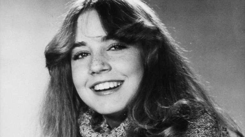 Dana Plato smiling in black and white picture circa 1985