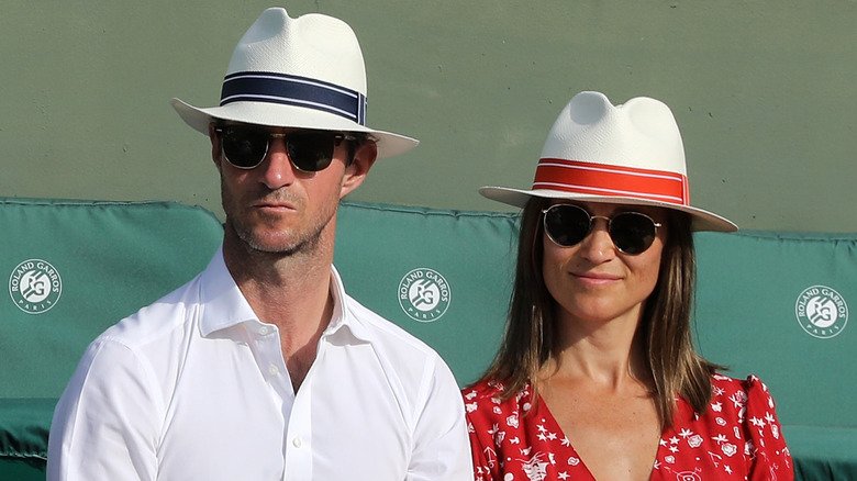 James Matthews and Pippa Middleton wearing sunglasses