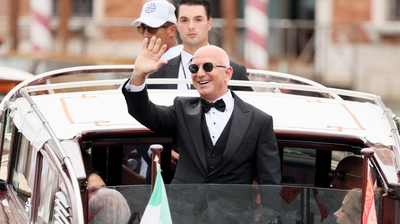 Jeff Bezos wearing a tux and sunglasses on a boat ahead of his Venice wedding