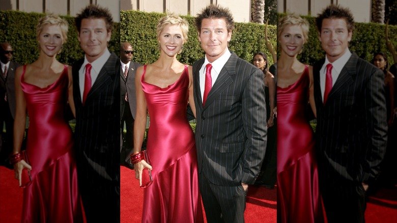 Behind the Curtain: The Complex Story of Ty Pennington 3 Andrea Bock and Ty Pennington posing for photos during the 57th Annual Primetime Creative Arts EMMY Awards