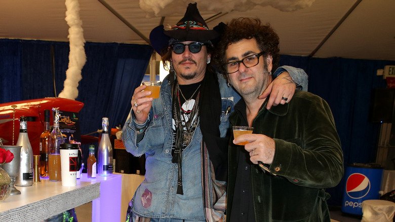 Johnny Depp and Bruce Witkin attending the GRAMMY Gift Lounge during The 58th GRAMMY Awards at Staples Center