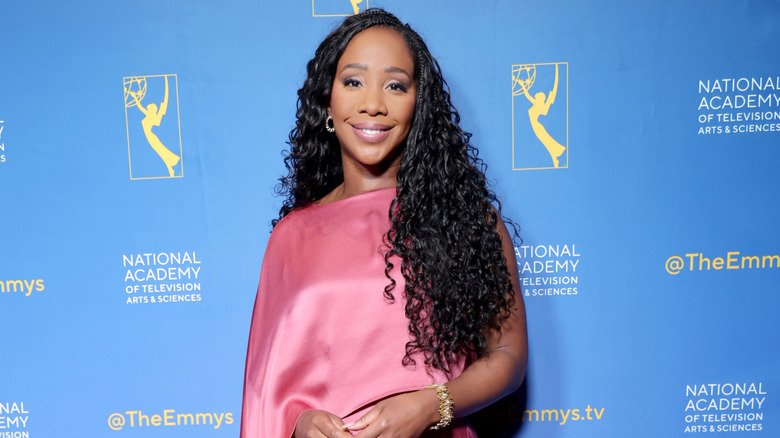 The Complex Journey of Abby Phillip: A Personal Look Beyond the Headlines 3 Abby Phillip posing on the red carpet at the 2025 News Emmy Awards.