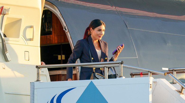 Laura Loomer exits Trump Force One