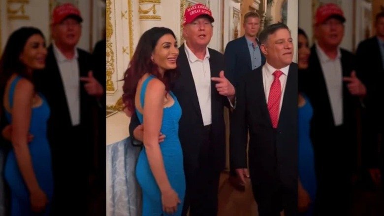 Donald Trump holding Laura Loomer's waist