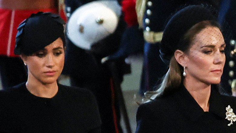 The Meghan Markle Rumors That Just Won't Quit 4 Meghan Markle and Kate Middleton in black at Queen Elizabeth's funeral