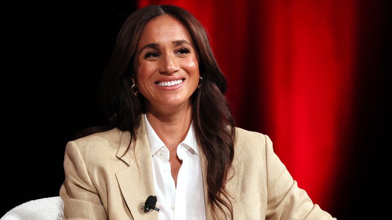 The Meghan Markle Rumors That Just Won't Quit 9 Meghan Markle smiling at the Time100 Summit