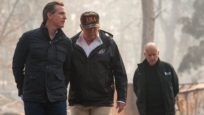 Gavin Newsom and Donald Trump walking together.