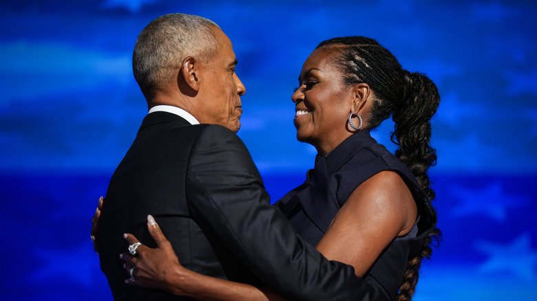 When the Spotlight Fades: Obama on Marriage, Messiness, and Moving Forward 2 Barack and Michelle Obama embrace on stage