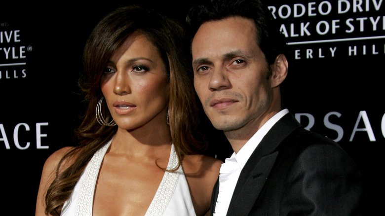 Jennifer Lopez posing with Marc Anthony