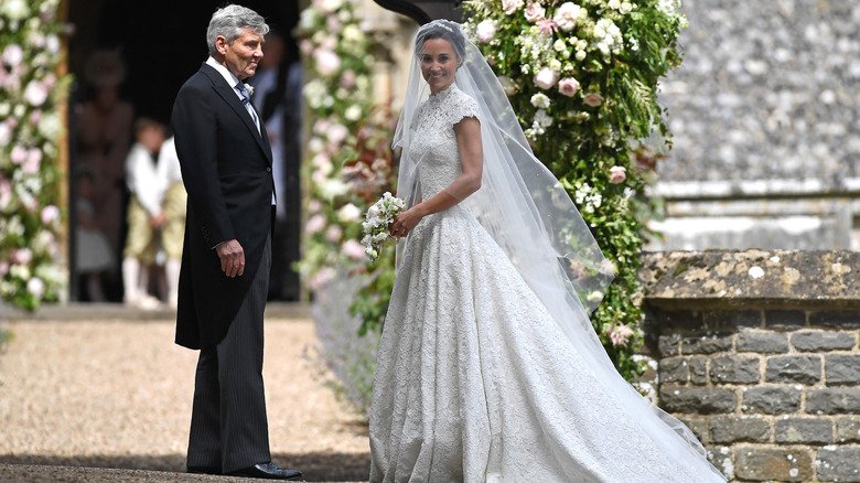 Michael and Pippa Middleton arrive at her wedding.