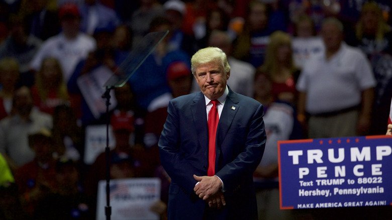 Rumors Trump Couldn't Shake. 135 Donald Trump at a rally with a Trump/Pence sign