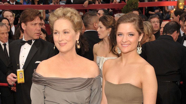 Louisa Jacobson and Meryl Streep smiling and posing together in formal gowns