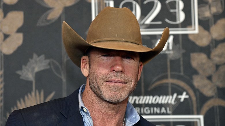Taylor Sheridan's Yellowstone: The Overlooked Dark Side 3 Taylor Sheridan poses in a cowboy hat