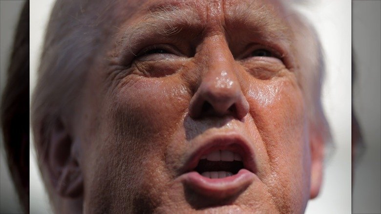 An extreme close-up of Donald Trump's face