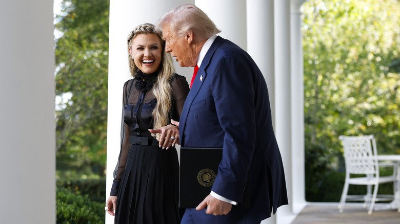 Erika Kirk holds Donald Trump's hand at Presidential Medal of Freedom ceremony