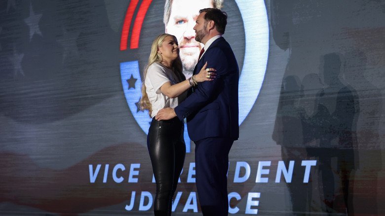 Erika Kirk and JD Vance hug at Turning Point USA event in October 2025