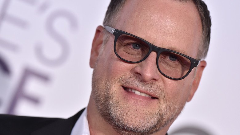Dave Coulier wearing glasses
