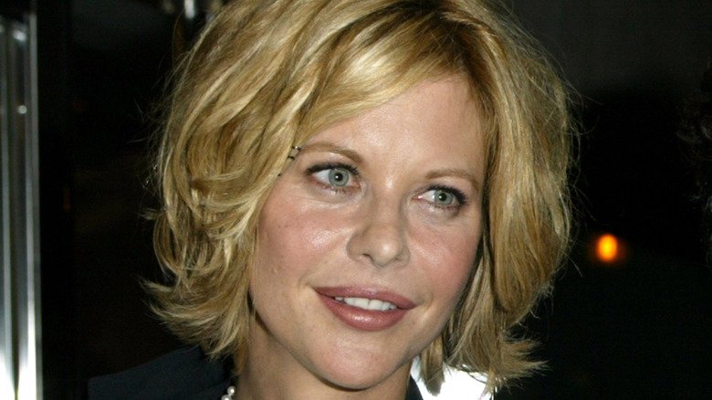 Meg Ryan smirking red carpet