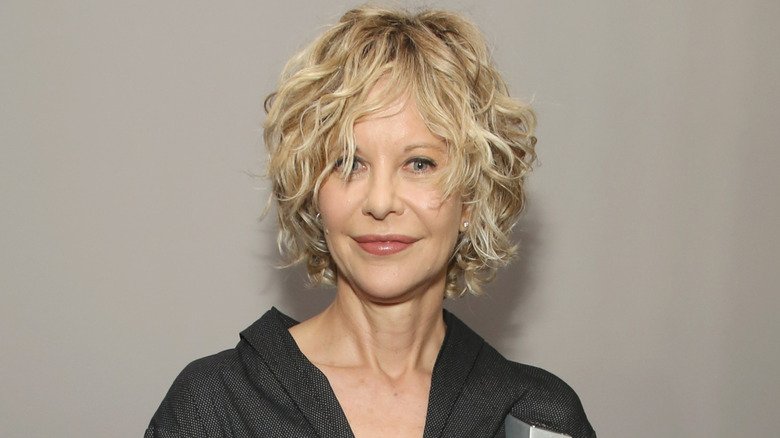 Meg Ryan smirking curly hair