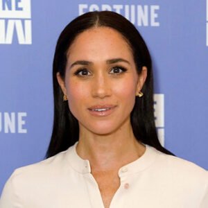 Meghan Markle Gives Her Ill Father A Middle Finger & Uses Harry As The Knife