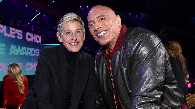 Ellen DeGeneres and Dwayne Johnson posing for a picture