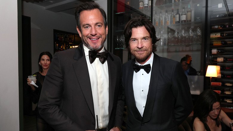 Will Arnett and Jason Bateman smiling and wearing tuxedos