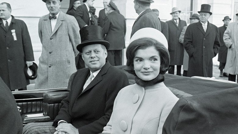 John F. Kennedy’s Alleged Affairs: The Women Linked to America’s 35th President 131 John F. Kennedy and Jackie Kennedy sit in a convertible car in 1961