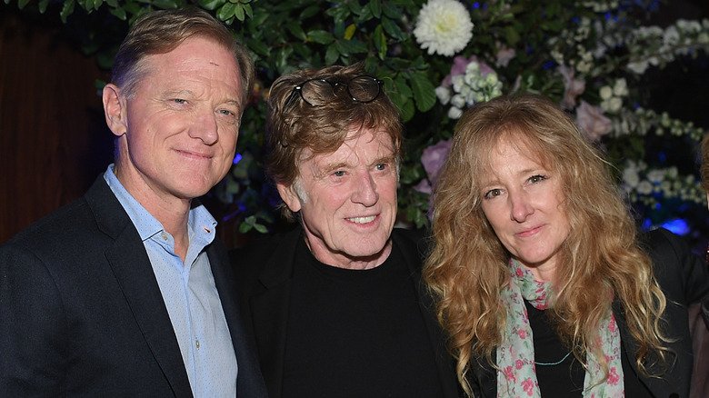 Growing Up Redford: Loss, Survival, and the Unscripted Parts of Family Life 130 James, Robert and Shauna Redford posing together.