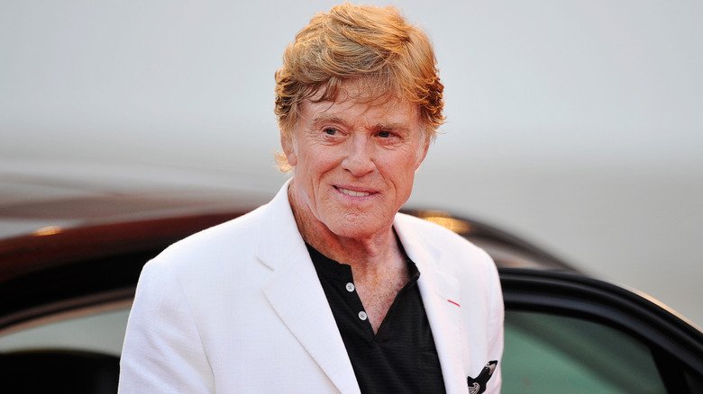 Growing Up Redford: Loss, Survival, and the Unscripted Parts of Family Life 132 Robert Redford posing on the red carpet.