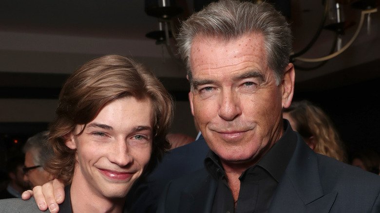 The Stunning Transformation Of Landman Star Jacob Lofland 129 Jacob Lofland posing with co-star Pierce Brosnan