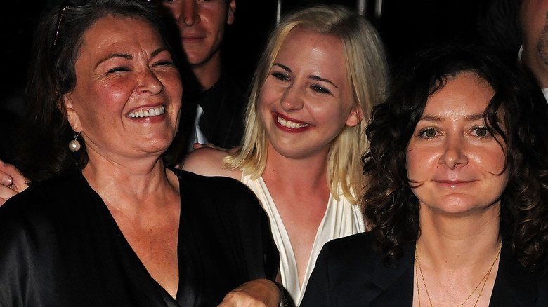 Roseanne Barr laughing alongside Sara Gilbert