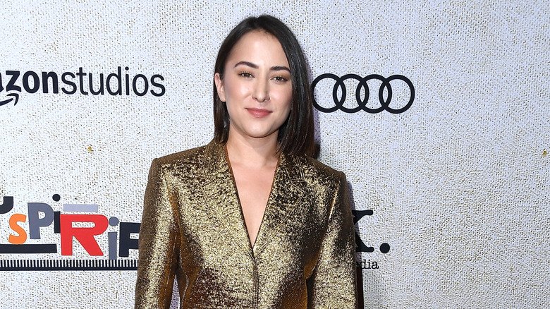 Zelda Williams' Transformation: A Stunning Sight 136 Zelda Williams wearing a gold dress while photographedin 2018
