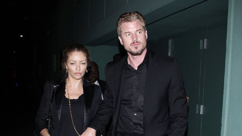 Rebecca Gayheart and Eric Dane walk hand-in-hand in 2009