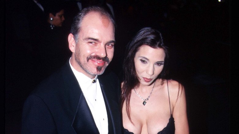 Billy Bob Thornton smiling with Pietra Dawn Cherniak at event