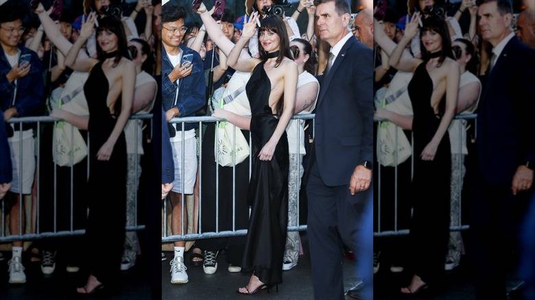 Dakota Johnson wearing a black Gucci dress at "Materialists" premiere