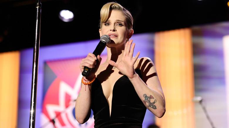 Kelly Osbourne making a speech onstage at the Race to Erase MS Gala.