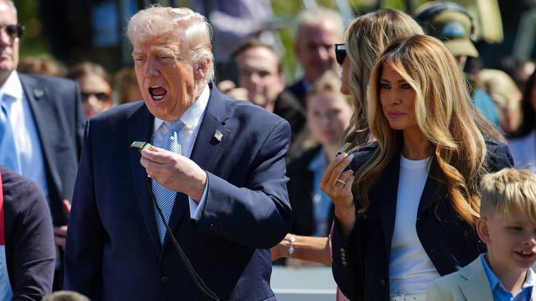 Donald Trump signaling the start of the 2026 Easter Egg Roll