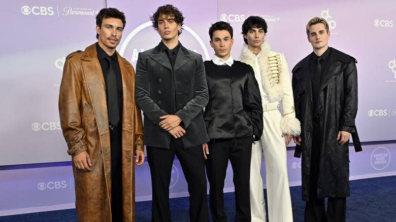 The 2026 American Music Awards Was A Fashion 139 Elevator Boys boyband wearing outfits in neutral colors on the 2026 AMAs red carpet.