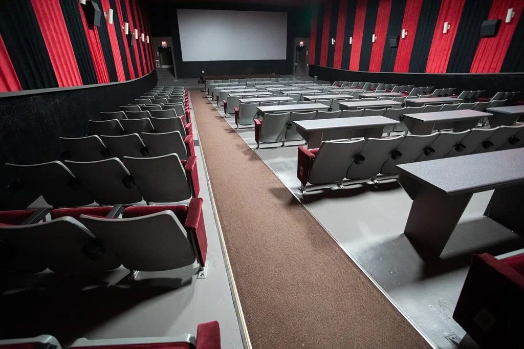 Cinema auditorium illustrating premium theatrical viewing and movie attendance