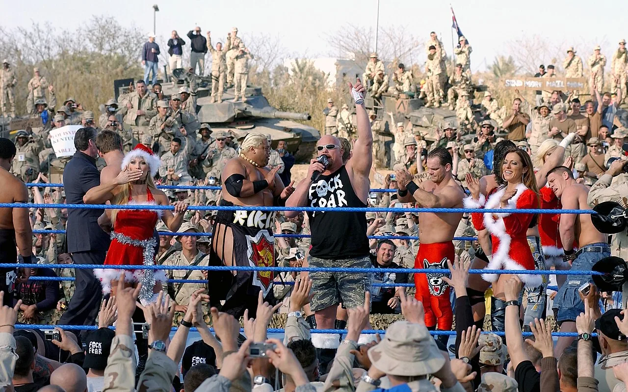 Dawn Marie appearing with WWE stars during a 2003 troop performance in Iraq