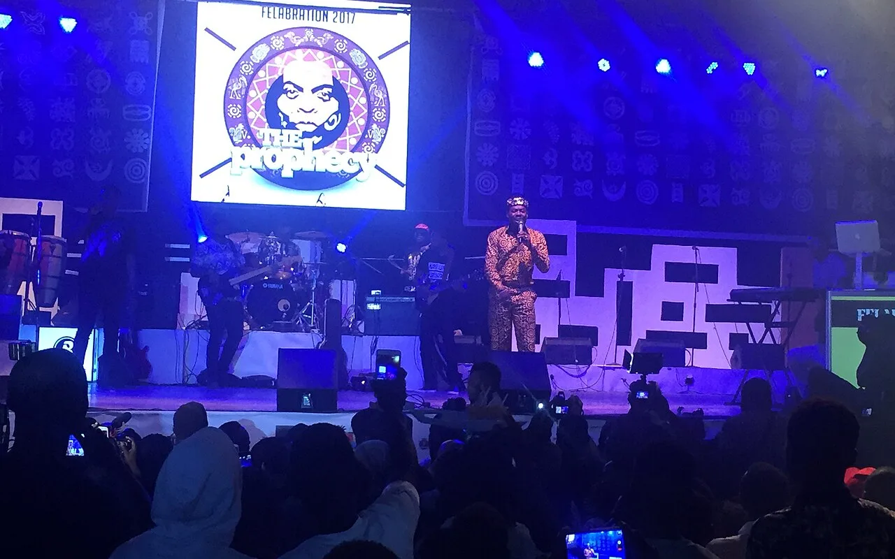 Adekunle Gold performing on stage at Felabration