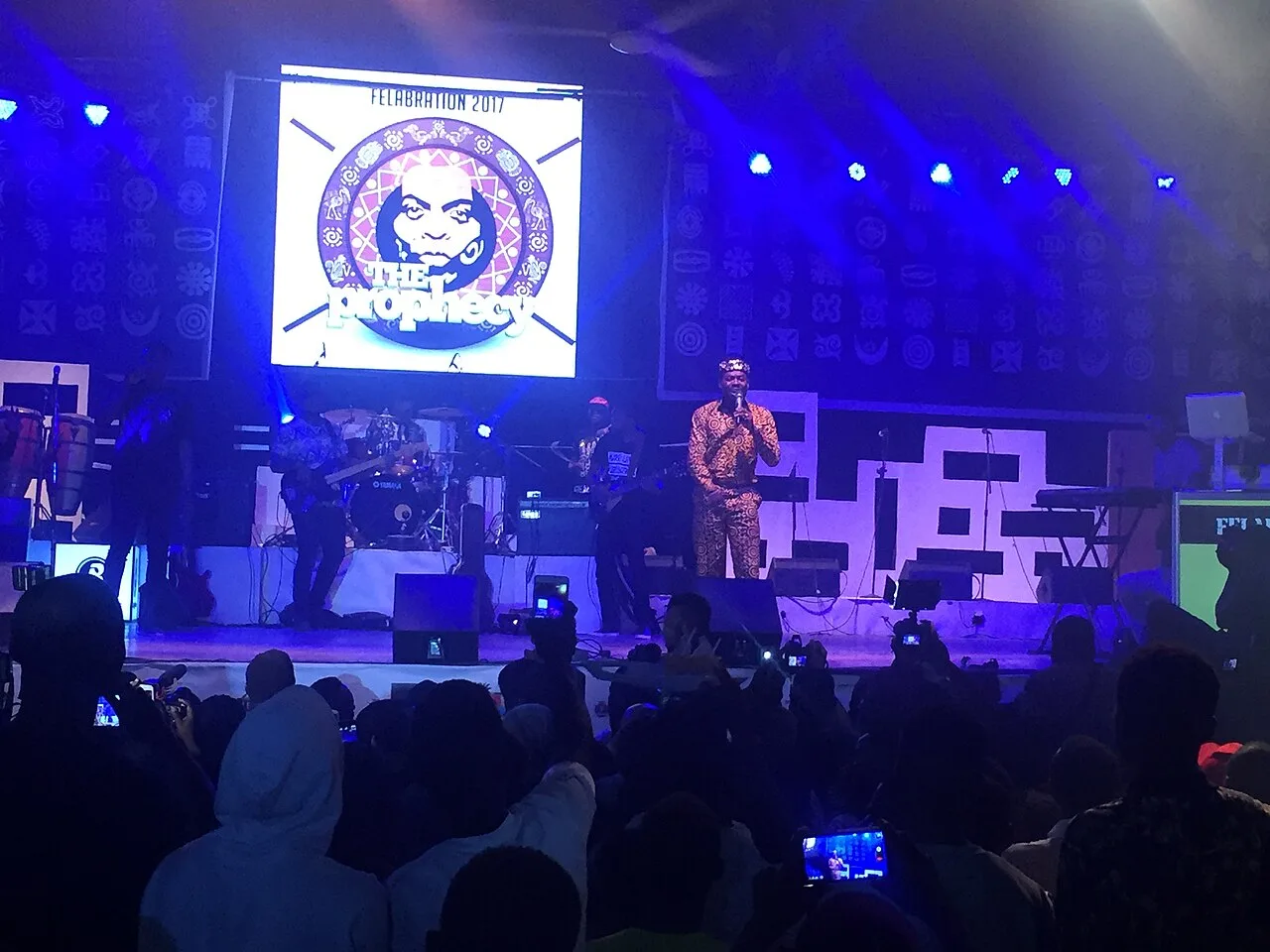 Open the featured image for Adekunle Gold Simile Story Reveals the Grief Behind His 2019 Song Adekunle Gold performing on stage at Felabration