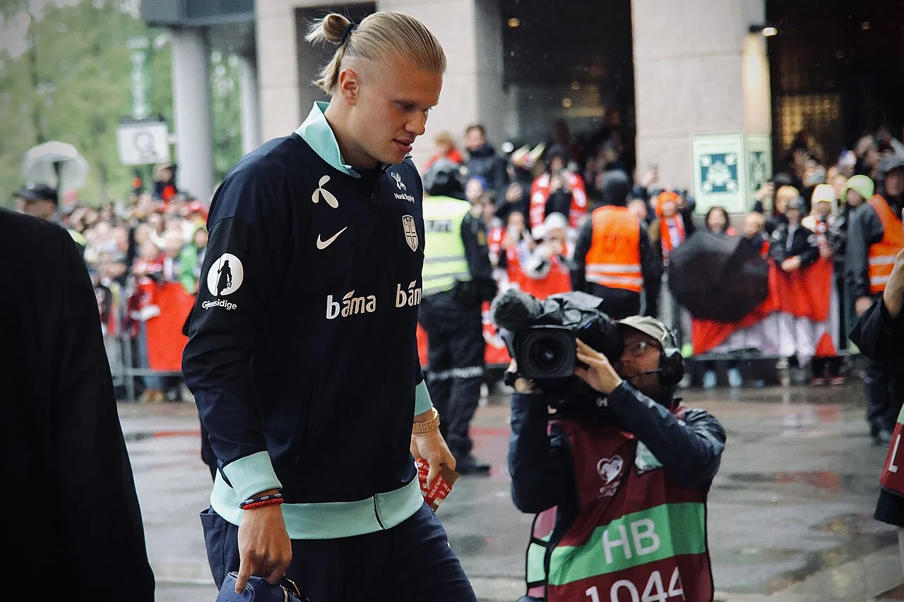 Open the featured image for Erling Haaland Buzzcut: Why He Called It a Fresh Start Erling Haaland playing for Norway against Italy in a 2026 World Cup qualifier in June 2025
